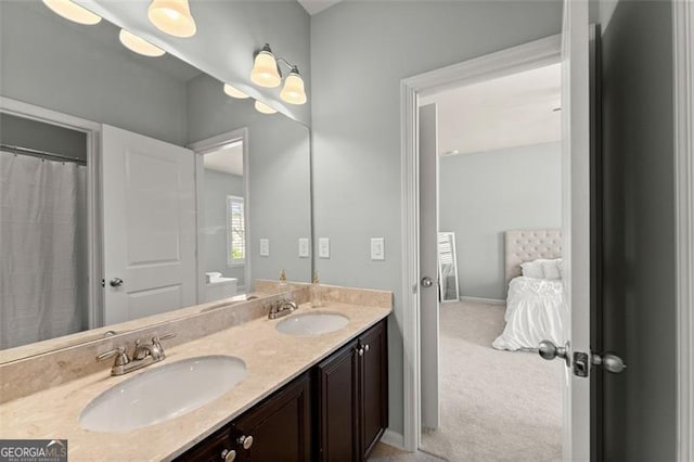 3317 Sweetleaf Ln, Buford, GA 30519 - bathroom featuring ensuite bathroom, double vanity, and baseboards