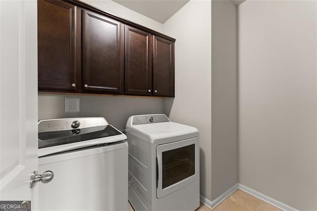 3317 Sweetleaf Ln, Buford, GA 30519 - laundry room with washer and dryer, cabinet space, and baseboards