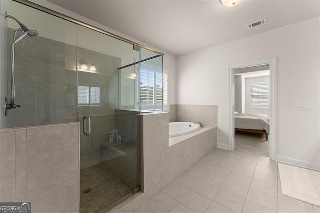 3317 Sweetleaf Ln, Buford, GA 30519 - bathroom with tile patterned flooring, a bath, a shower stall, and connected bathroom