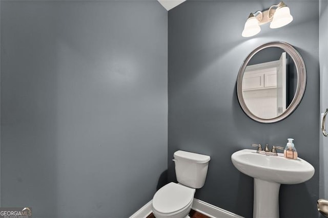 3317 Sweetleaf Ln, Buford, GA 30519 - bathroom with toilet and baseboards