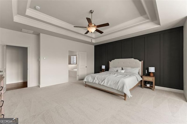 3317 Sweetleaf Ln, Buford, GA 30519 - bedroom with a raised ceiling, light colored carpet, crown molding, ceiling fan, and ensuite bathroom