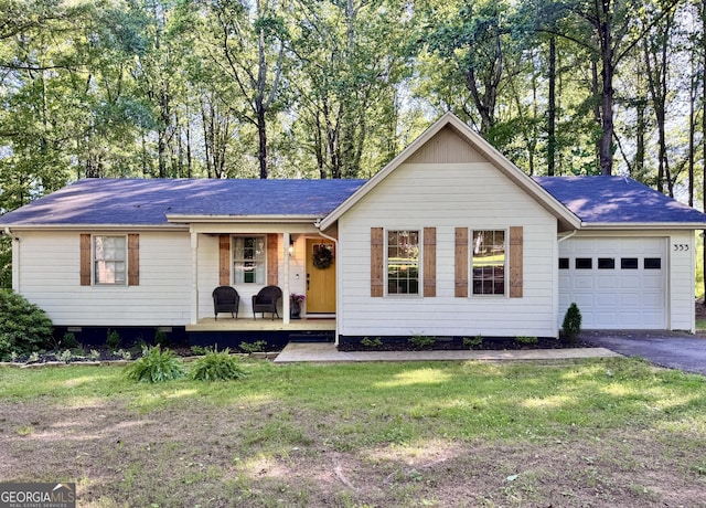 353 Lewis Cir, Commerce, GA 30529 - ranch-style house featuring covered porch, a garage, driveway, a front lawn, and a shingled roof