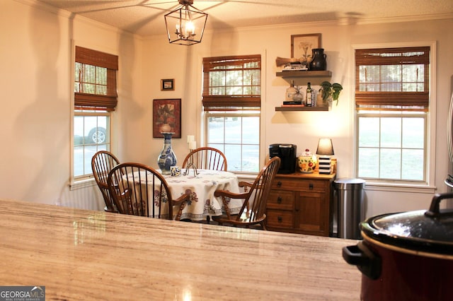 353 Lewis Cir, Commerce, GA 30529 - dining room featuring ornamental molding and a chandelier