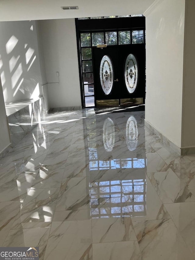 2119 Pine Heights Dr NE, Atlanta, GA 30324 - foyer entrance featuring marble tiled floors