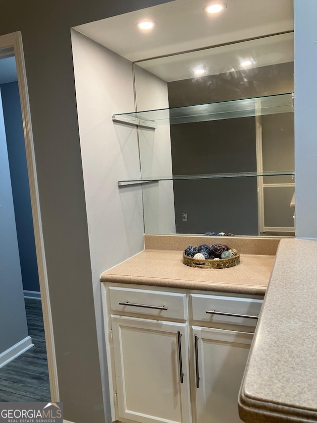 2119 Pine Heights Dr NE, Atlanta, GA 30324 - detailed view of wood finished floors, recessed lighting, and baseboards