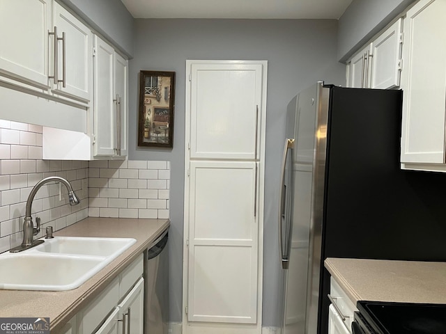 2119 Pine Heights Dr NE, Atlanta, GA 30324 - kitchen with a sink, stainless steel dishwasher, white cabinetry, tasteful backsplash, and light countertops