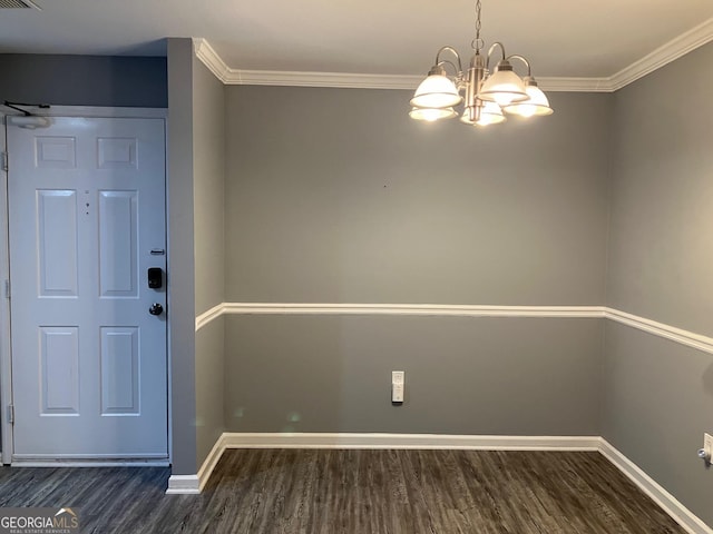 2119 Pine Heights Dr NE, Atlanta, GA 30324 - unfurnished room featuring dark wood-type flooring, baseboards, a chandelier, and ornamental molding
