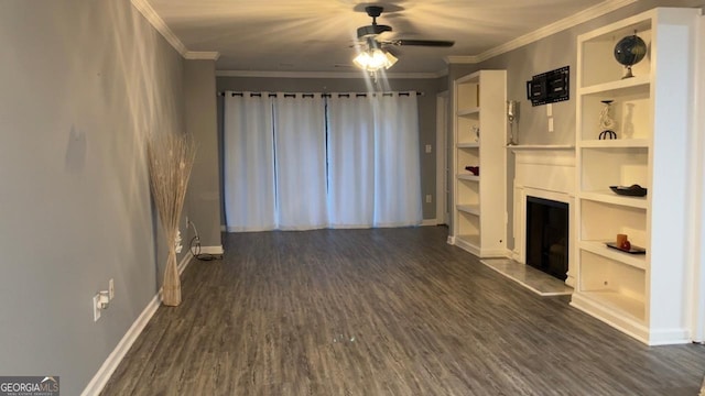 2119 Pine Heights Dr NE, Atlanta, GA 30324 - unfurnished living room with ceiling fan, a fireplace with raised hearth, dark wood-type flooring, baseboards, and crown molding
