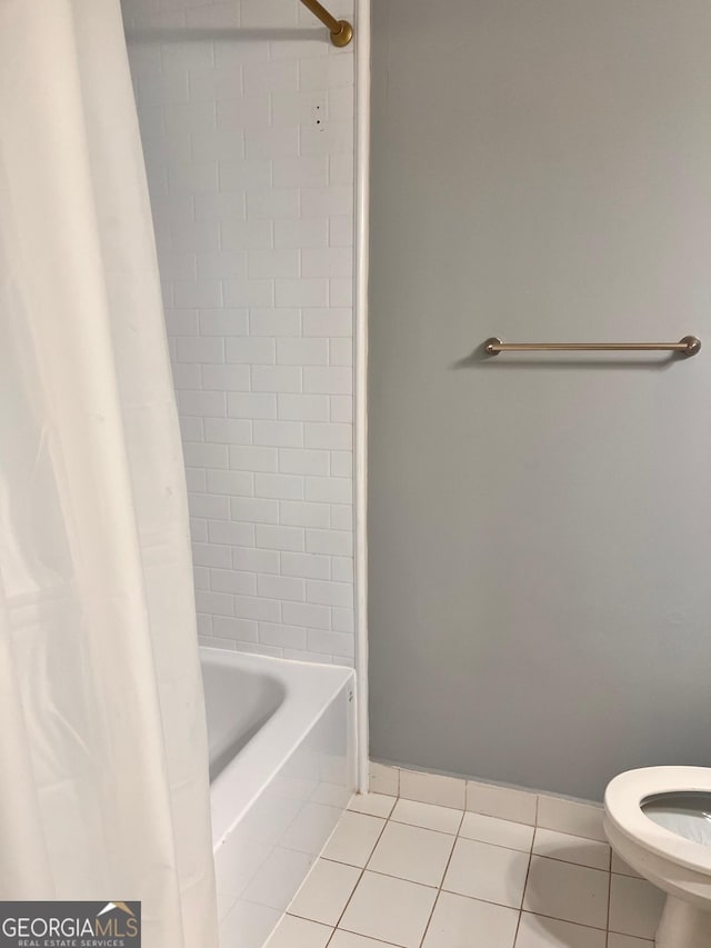 2119 Pine Heights Dr NE, Atlanta, GA 30324 - bathroom featuring tile patterned flooring, toilet, and shower / bath combination