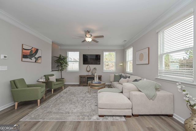 2861 Fareed Unit 40, Douglasville, GA 30135 - living room featuring wood finished floors, crown molding, a ceiling fan, and baseboards
