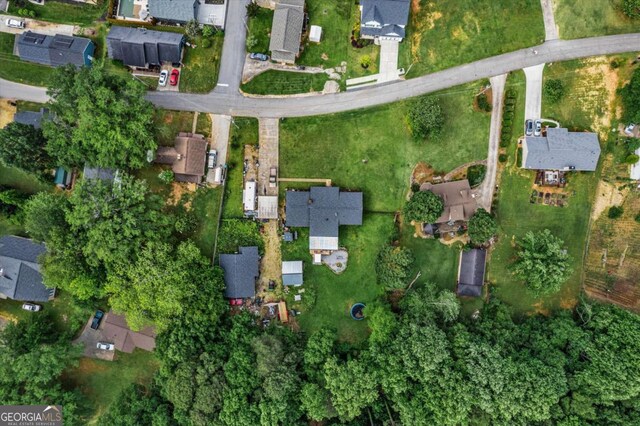 140 Wilbanks St, Buford, GA 30518 - aerial overview of property's location with nearby suburban area