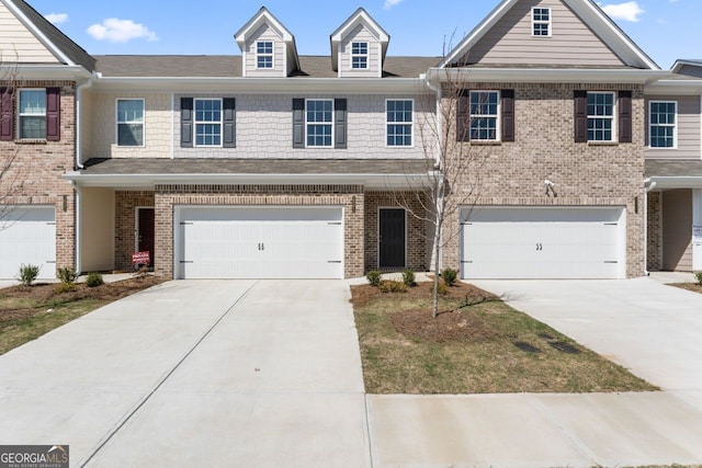2841 Fareed, Douglasville, GA 30135 - multi unit property featuring an attached garage, driveway, brick siding, and a shingled roof