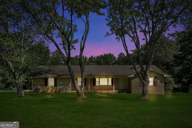 4911 Old Douglasville Rd, Lithia Springs, GA 30122 - ranch-style house with a lawn and brick siding