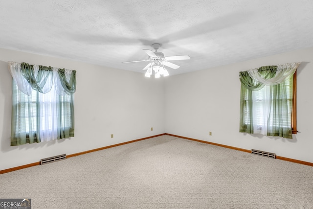4911 Old Douglasville Rd, Lithia Springs, GA 30122 - unfurnished room with carpet floors, baseboards, and a ceiling fan