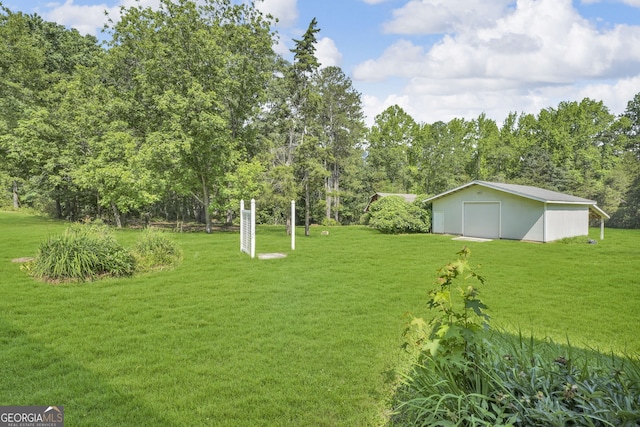 4911 Old Douglasville Rd, Lithia Springs, GA 30122 - view of green lawn with an outdoor structure and an outbuilding