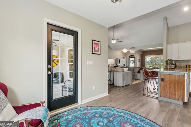 102 Bowline Ln, Kingsland, GA 31548 - living area with ceiling fan, light wood-style floors, and baseboards
