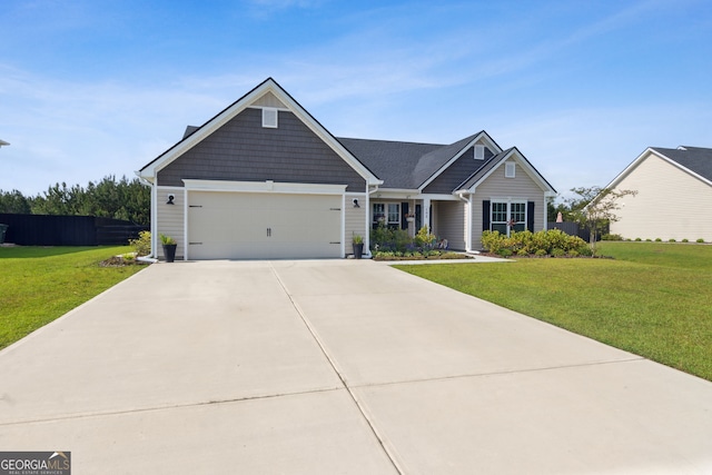 102 Bowline Ln, Kingsland, GA 31548 - view of front facade with a garage and driveway