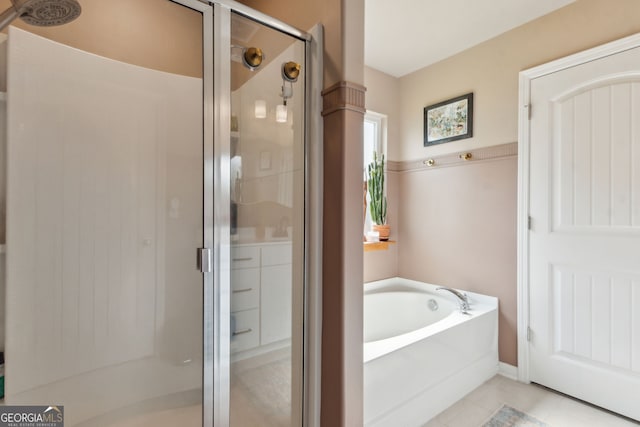 102 Bowline Ln, Kingsland, GA 31548 - full bath with a stall shower, a garden tub, and tile patterned flooring