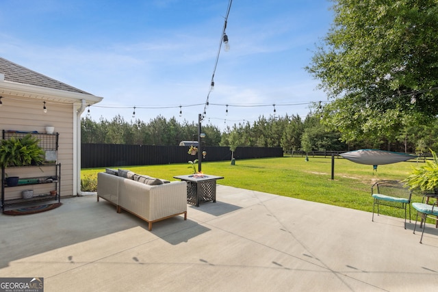 102 Bowline Ln, Kingsland, GA 31548 - view of patio with an outdoor living space with a fire pit