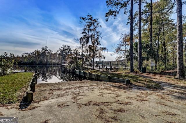 102 Bowline Ln, Kingsland, GA 31548 - dock area featuring a water view