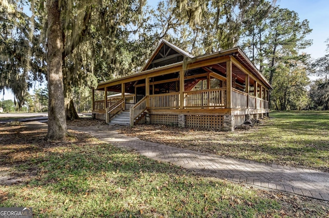 102 Bowline Ln, Kingsland, GA 31548 - view of front of property with a front yard and covered porch