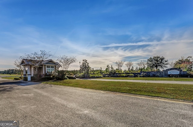 102 Bowline Ln, Kingsland, GA 31548 - view of front of property with a front yard and driveway