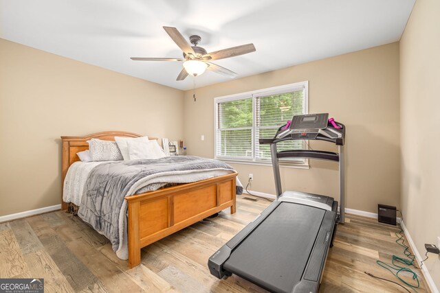 751 Hawkins Rd, Homer, GA 30547 - bedroom with baseboards, light wood-style floors, and ceiling fan