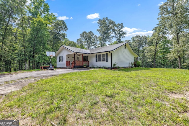 751 Hawkins Rd, Homer, GA 30547 - single story home with a front yard, a porch, and metal roof