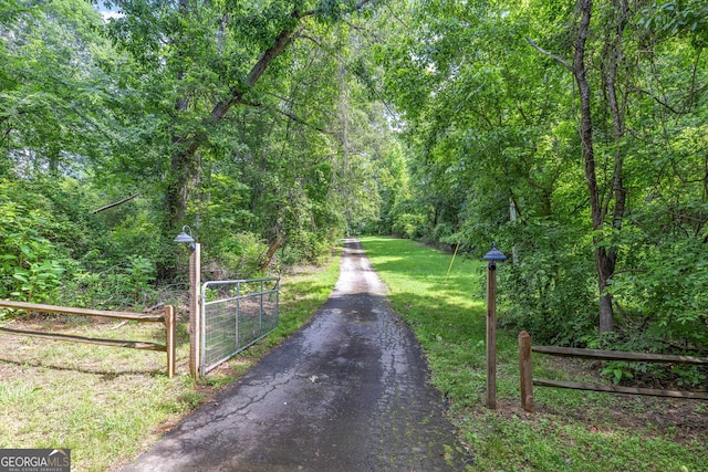 751 Hawkins Rd, Homer, GA 30547 - view of road with a view of trees and a gate