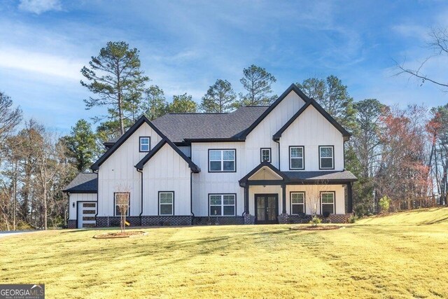 29 Cedar Blf, Winder, GA 30680 - modern inspired farmhouse featuring french doors, a front lawn, board and batten siding, and a shingled roof