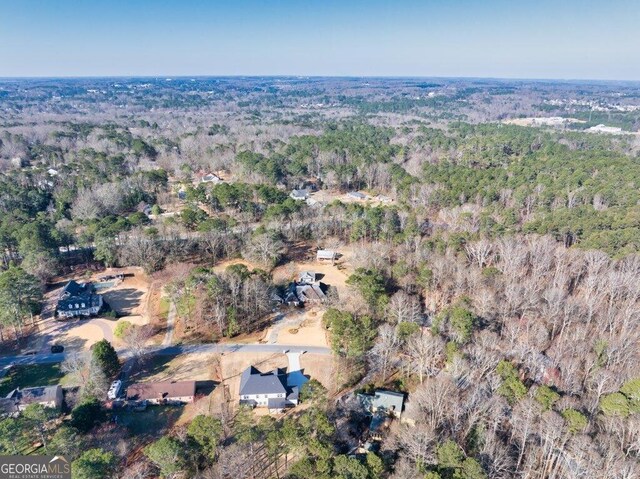 29 Cedar Blf, Winder, GA 30680 - aerial view of property and surrounding area with a heavily wooded area