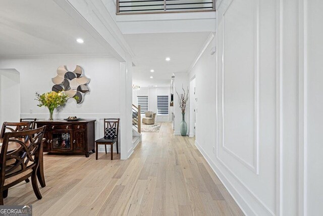 29 Cedar Blf, Winder, GA 30680 - hallway featuring light wood-style flooring, crown molding, and recessed lighting