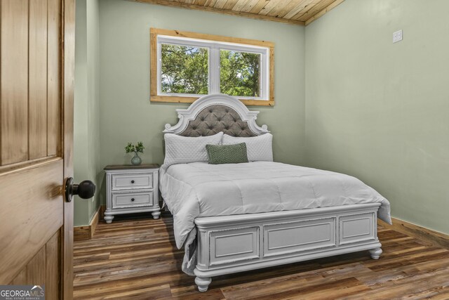 795 E Jones Chapel Rd, Danielsville, GA 30633 - bedroom featuring dark wood-style floors and wood ceiling
