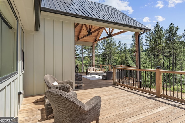 795 E Jones Chapel Rd, Danielsville, GA 30633 - wooden terrace with an outdoor living space and view of wooded area
