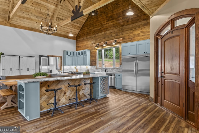 795 E Jones Chapel Rd, Danielsville, GA 30633 - kitchen featuring stainless steel appliances, a wood ceiling with exposed beams, a spacious island, high vaulted ceiling, and dark wood finished floors