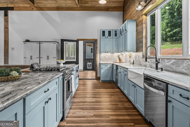 795 E Jones Chapel Rd, Danielsville, GA 30633 - kitchen with stainless steel appliances, light stone countertops, dark wood-style flooring, wood ceiling, and backsplash