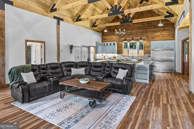795 E Jones Chapel Rd, Danielsville, GA 30633 - living room with high vaulted ceiling, a wooden ceiling with exposed beams, dark wood finished floors, and a chandelier