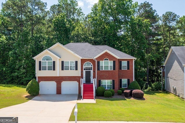 4348 Tillage Path, Douglasville, GA 30135 - split foyer home with a garage, driveway, brick siding, and a front yard