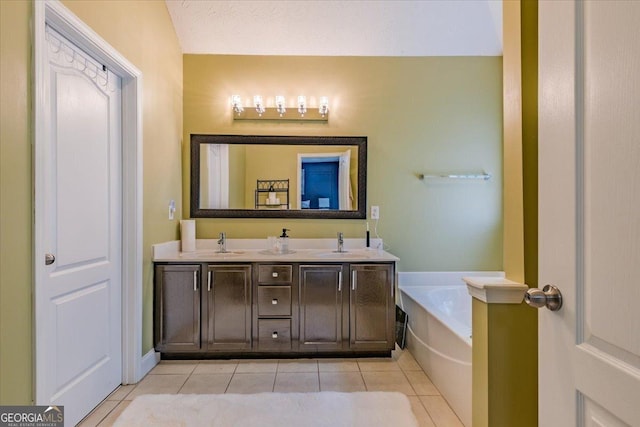 4348 Tillage Path, Douglasville, GA 30135 - bathroom with tile patterned floors, double vanity, and a bath