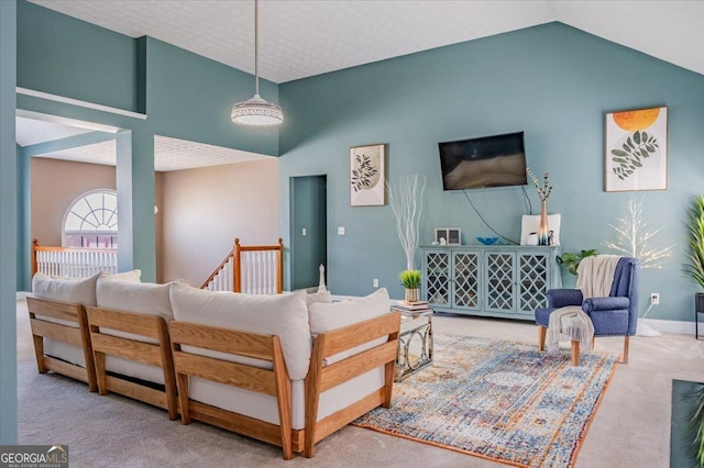 4348 Tillage Path, Douglasville, GA 30135 - living area featuring vaulted ceiling, carpet, and baseboards