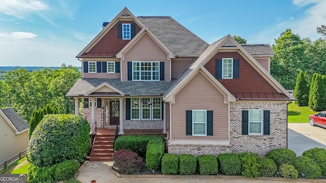 168 Observation Pt, Dallas, GA 30132 - craftsman-style home featuring brick siding, a porch, and a shingled roof