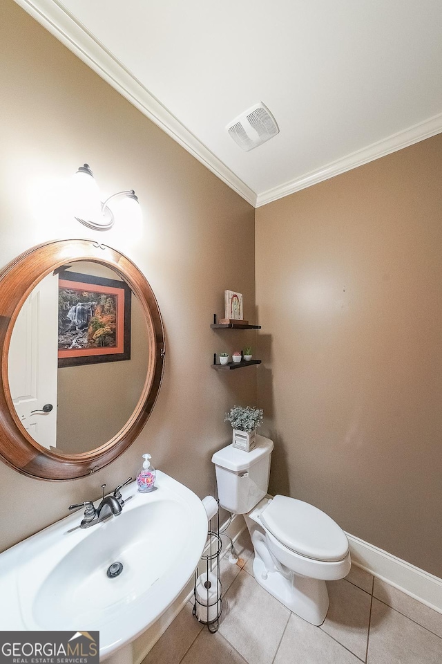 168 Observation Pt, Dallas, GA 30132 - half bathroom with ornamental molding, toilet, a sink, tile patterned flooring, and baseboards