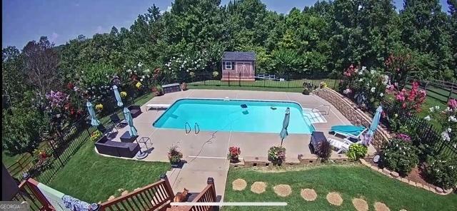 168 Observation Pt, Dallas, GA 30132 - view of pool featuring an outdoor structure and a patio area