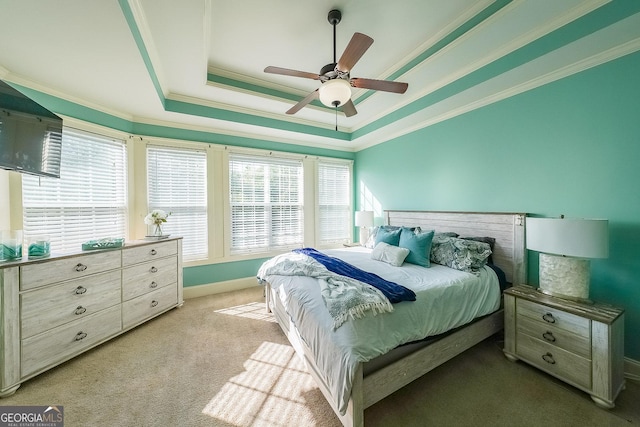 168 Observation Pt, Dallas, GA 30132 - bedroom featuring ornamental molding, light carpet, baseboards, a raised ceiling, and a ceiling fan