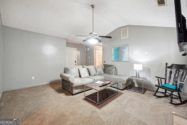11529 Vinea Ln, Hampton, GA 30228 - living room with carpet floors, vaulted ceiling, a ceiling fan, and baseboards