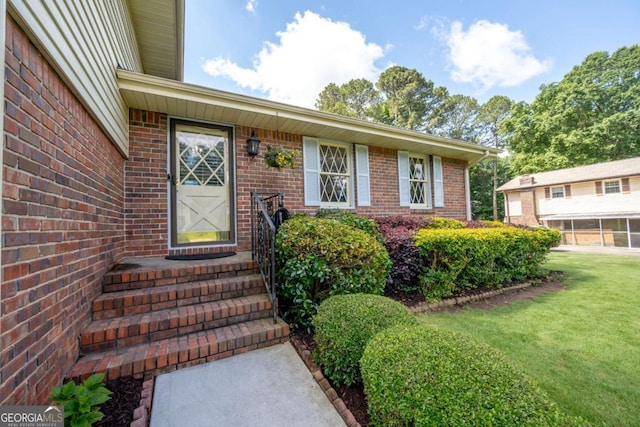 4205 Jeri Lynn Ct, Tucker, GA 30084 - doorway to property featuring brick siding and a lawn