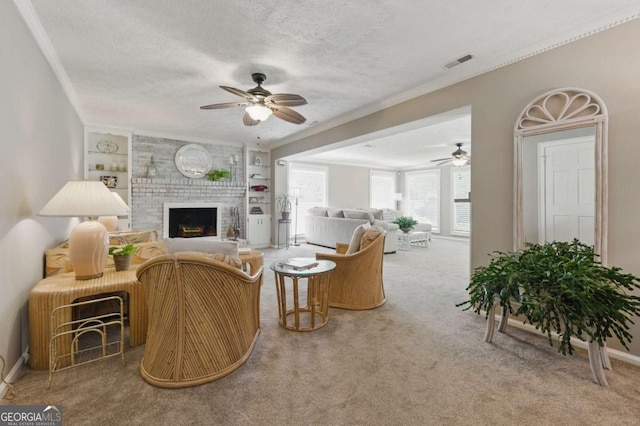 4205 Jeri Lynn Ct, Tucker, GA 30084 - living room featuring a ceiling fan, carpet floors, ornamental molding, a fireplace, and a textured ceiling
