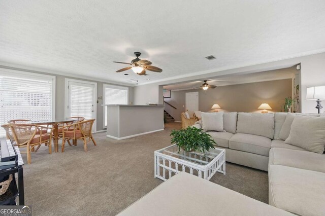 4205 Jeri Lynn Ct, Tucker, GA 30084 - carpeted living room with ceiling fan, stairway, and baseboards
