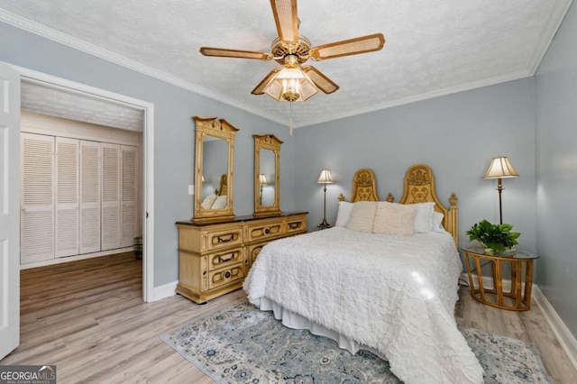 4205 Jeri Lynn Ct, Tucker, GA 30084 - bedroom with light wood-style floors, baseboards, a ceiling fan, and a textured ceiling