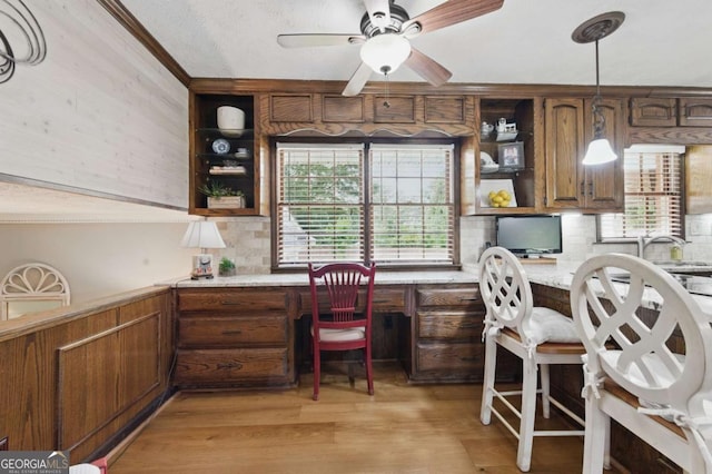 4205 Jeri Lynn Ct, Tucker, GA 30084 - office space featuring built in desk, a ceiling fan, crown molding, and light wood finished floors